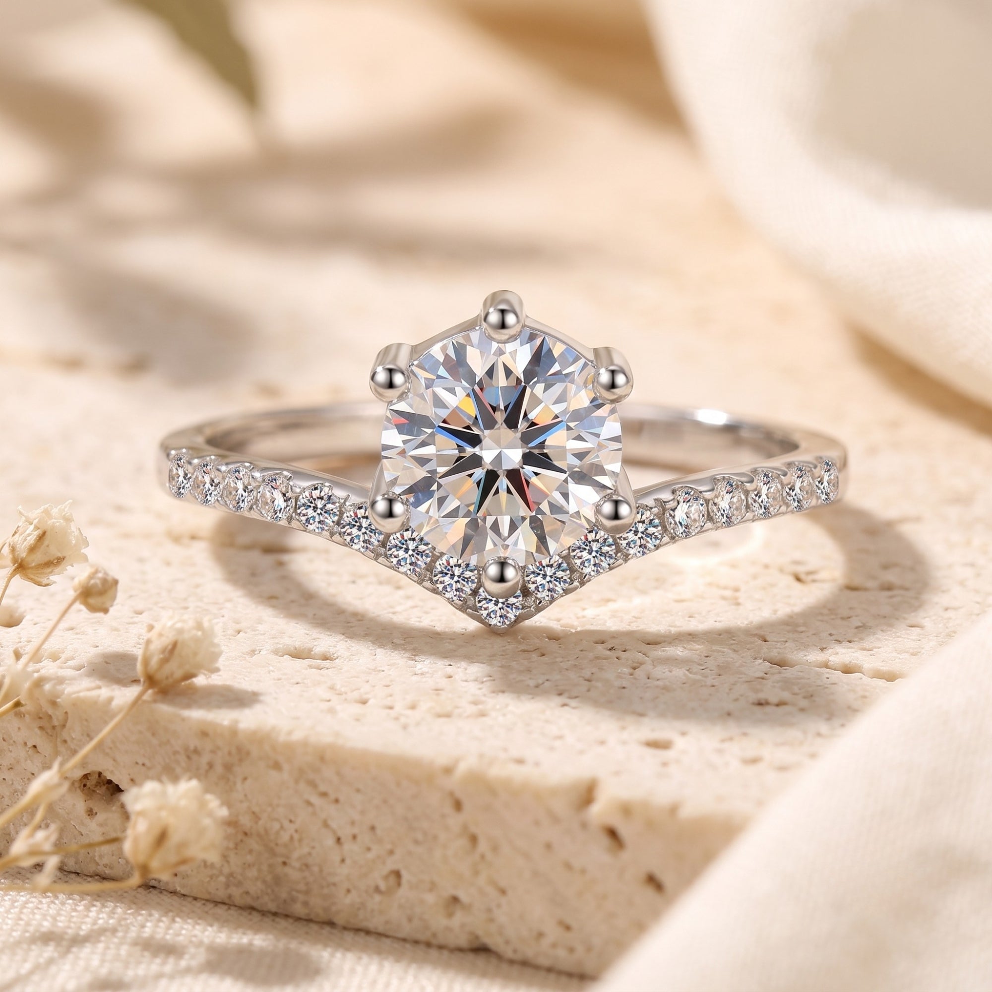 S925 silver chevron ring with round cubic zirconia on stone.