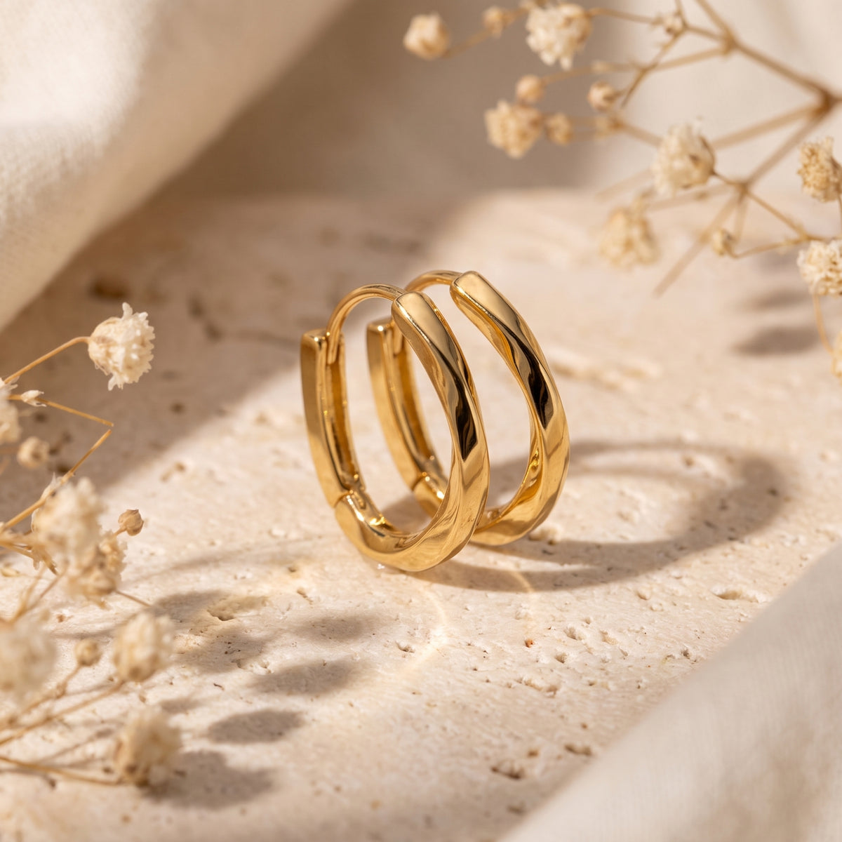 The Twisted Hoop Earrings