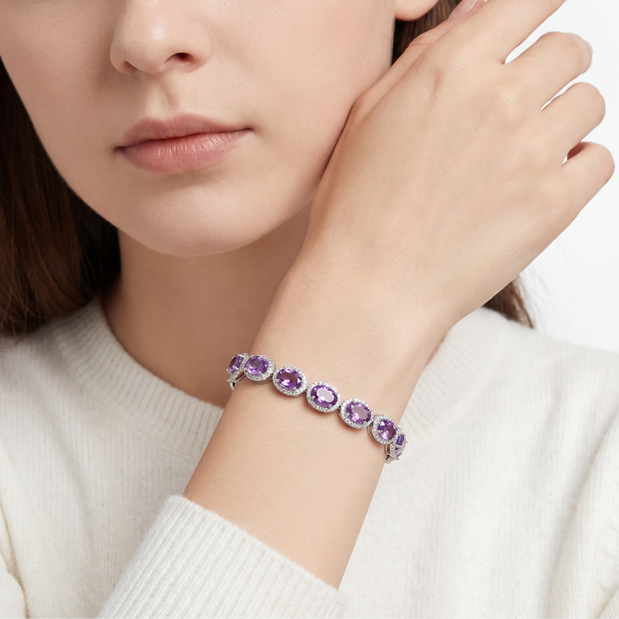 Model wearing the Elysian Halo oval-cut simulated amethyst bracelet in S925 sterling silver.