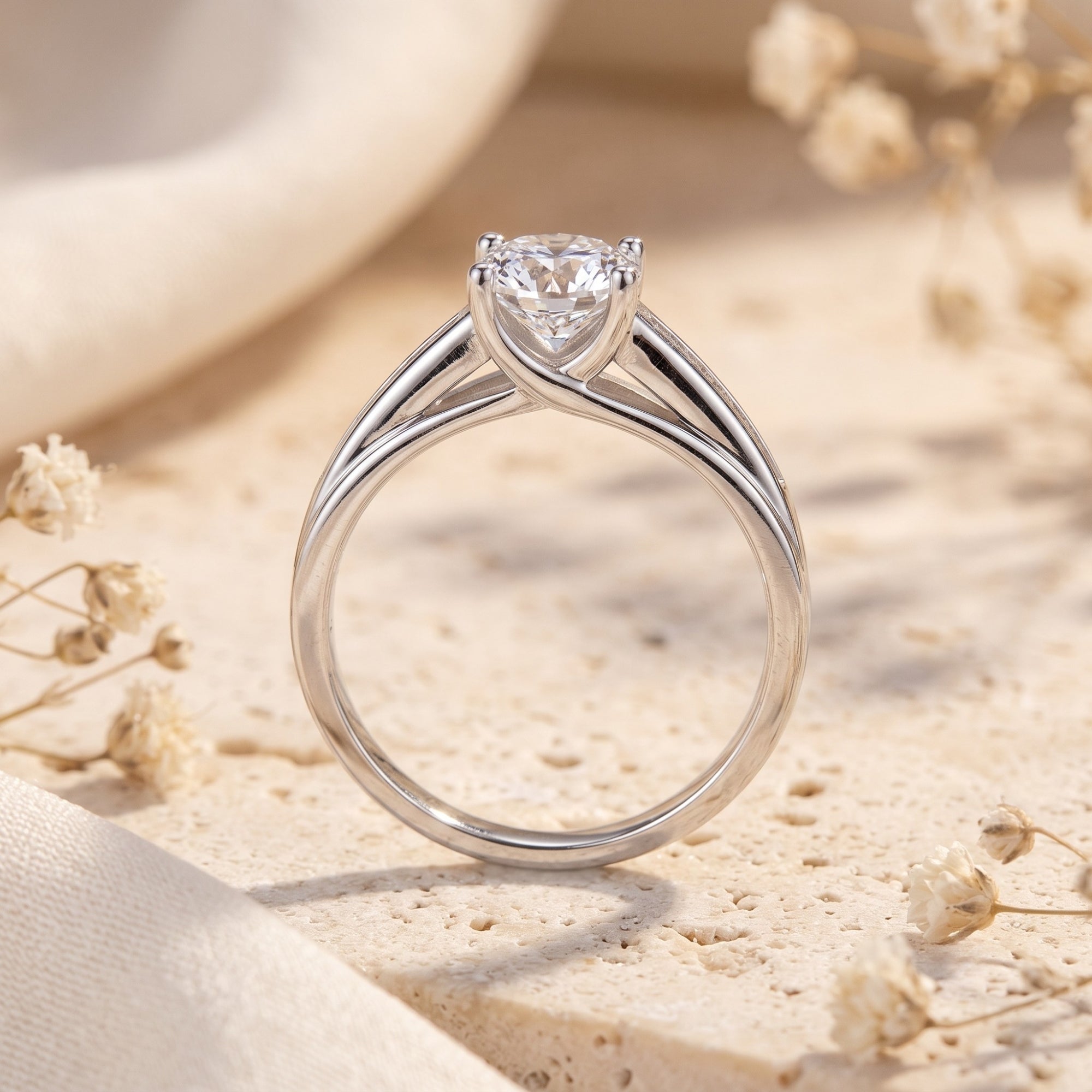 Profile view of the S925 sterling silver crossover cathedral setting and round brilliant cut simulated diamond.