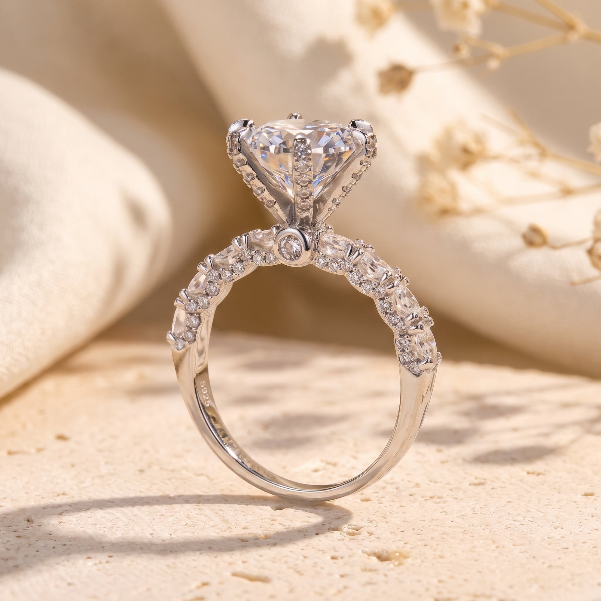 Side view of the S925 sterling silver Stella ring showing the low-profile cathedral setting.