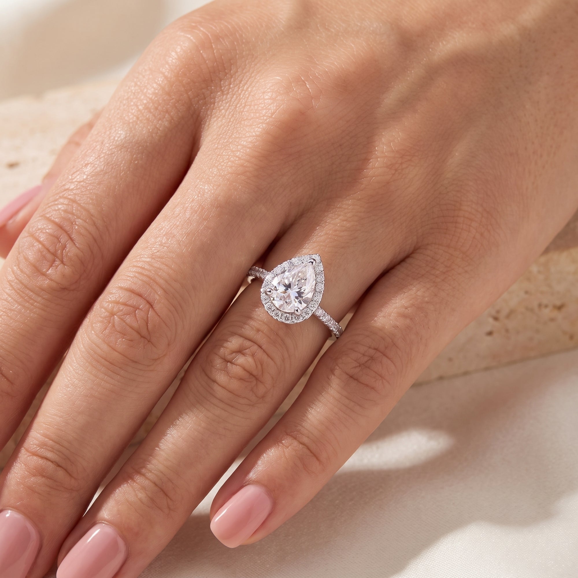 The Aurelia Pear Halo Ring