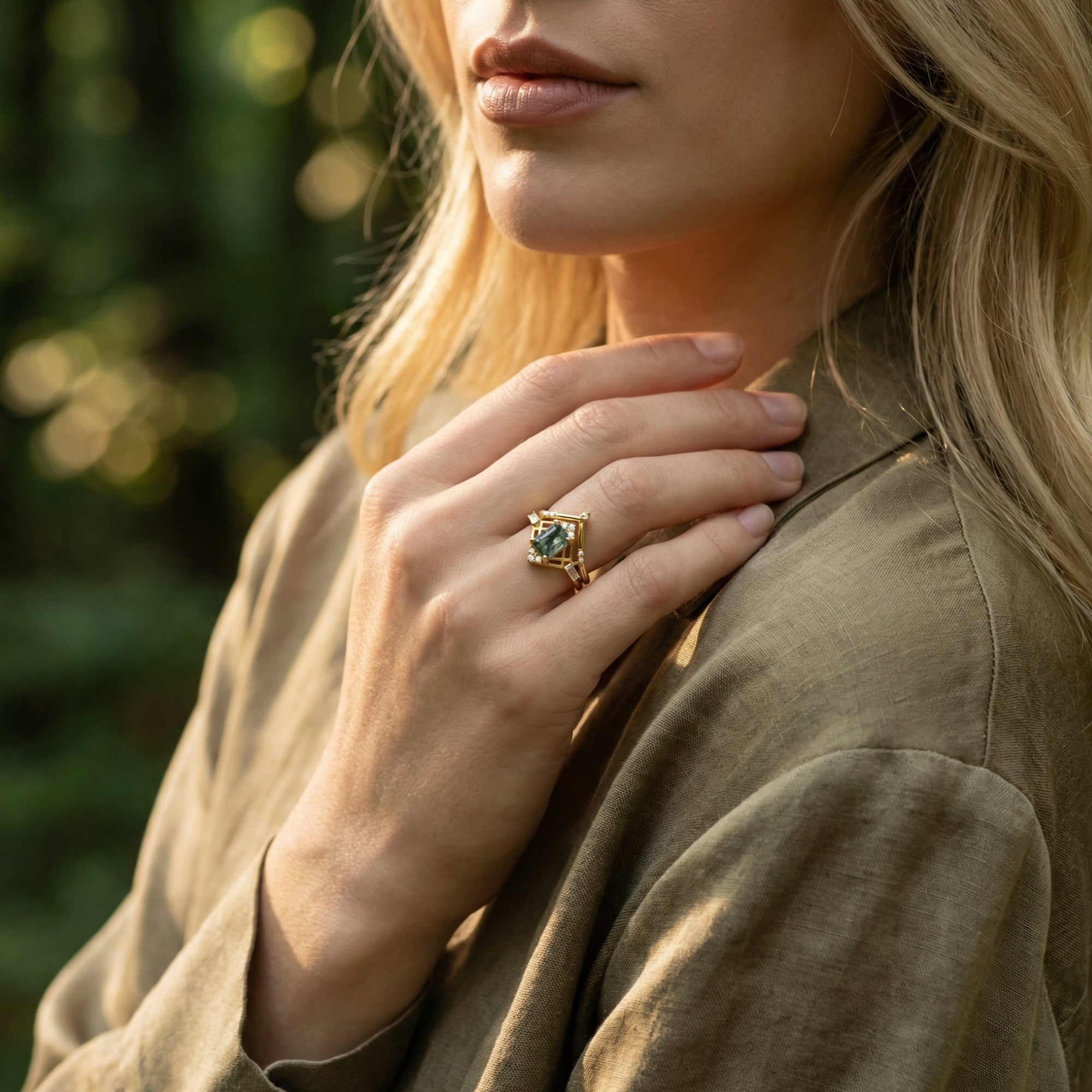Gold-plated moss agate geometric frame ring set worn by a model in a lifestyle outdoor shot.
