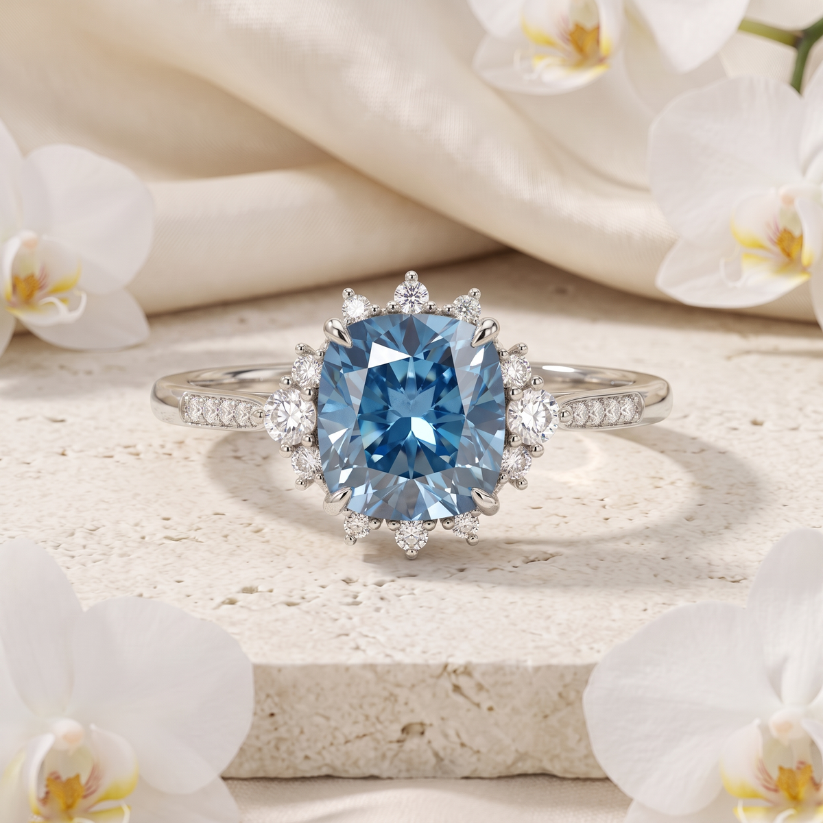 Front view of a white gold cushion-cut blue moissanite ring with a diamond halo.