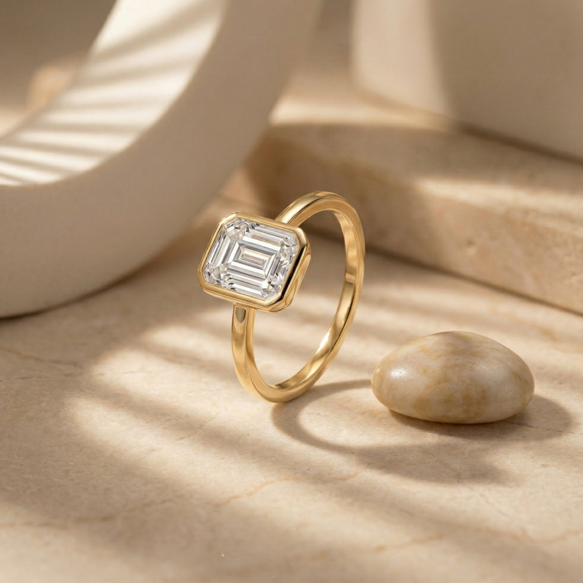 The Astrid Emerald Cut Bezel Ring