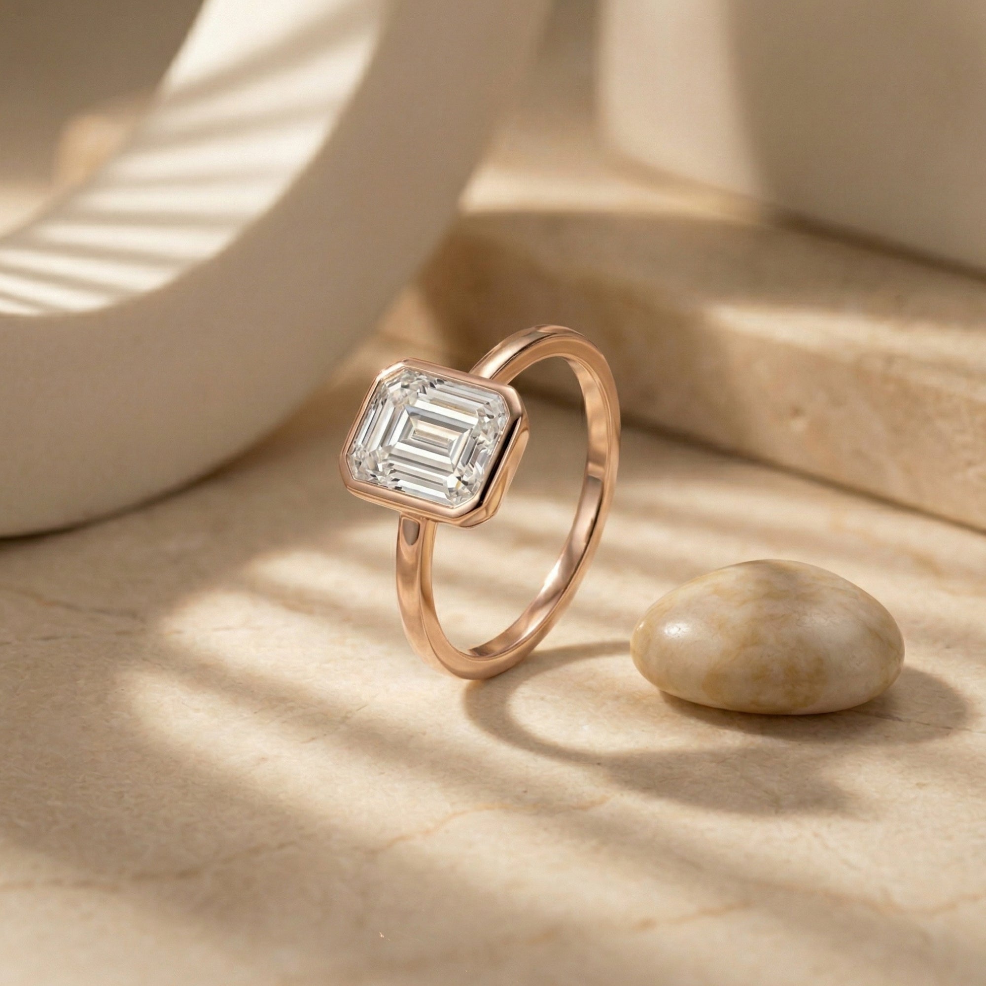 The Astrid Emerald Cut Bezel Ring