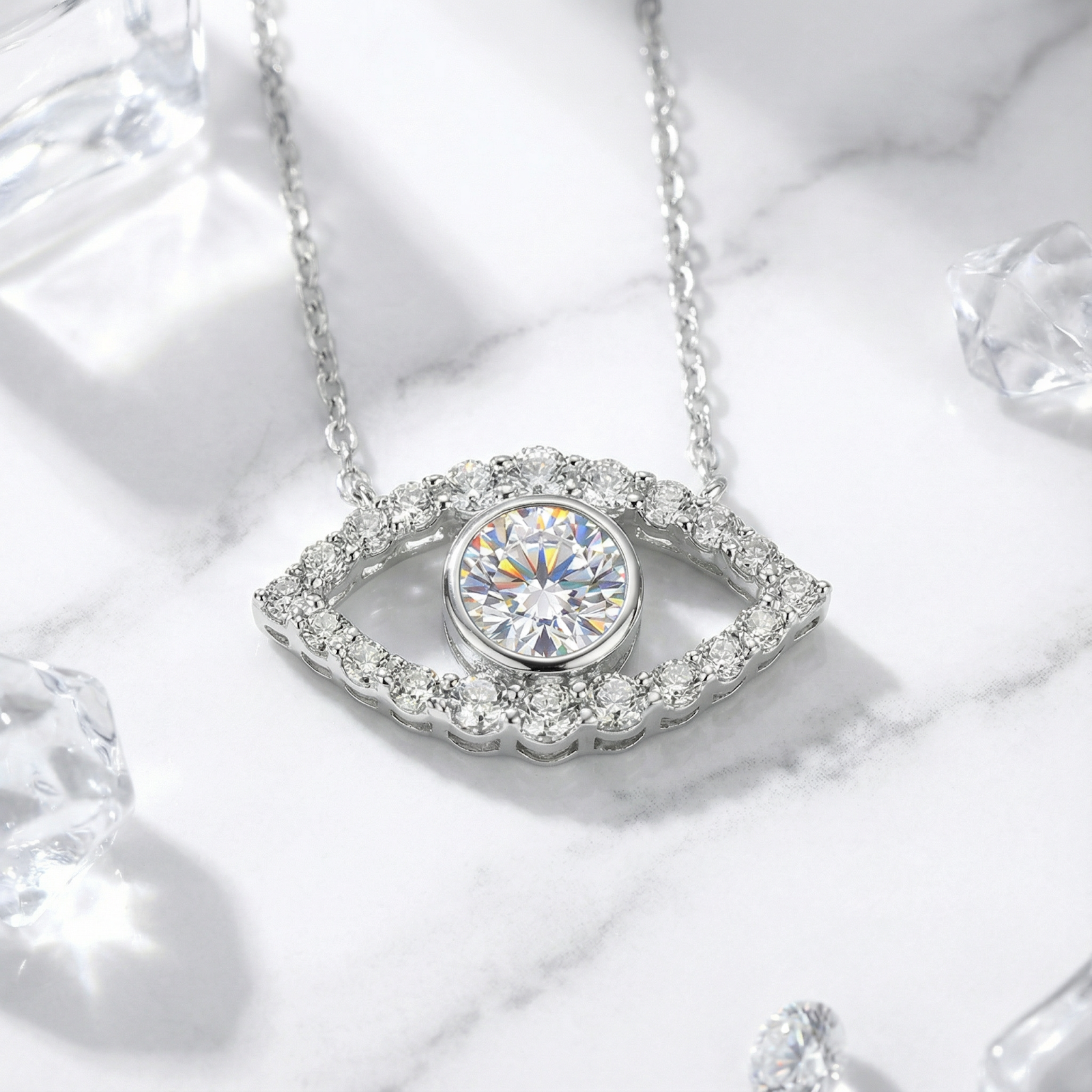 Macro view of the round cut moissanite center stone and halo in the silver evil eye pendant.