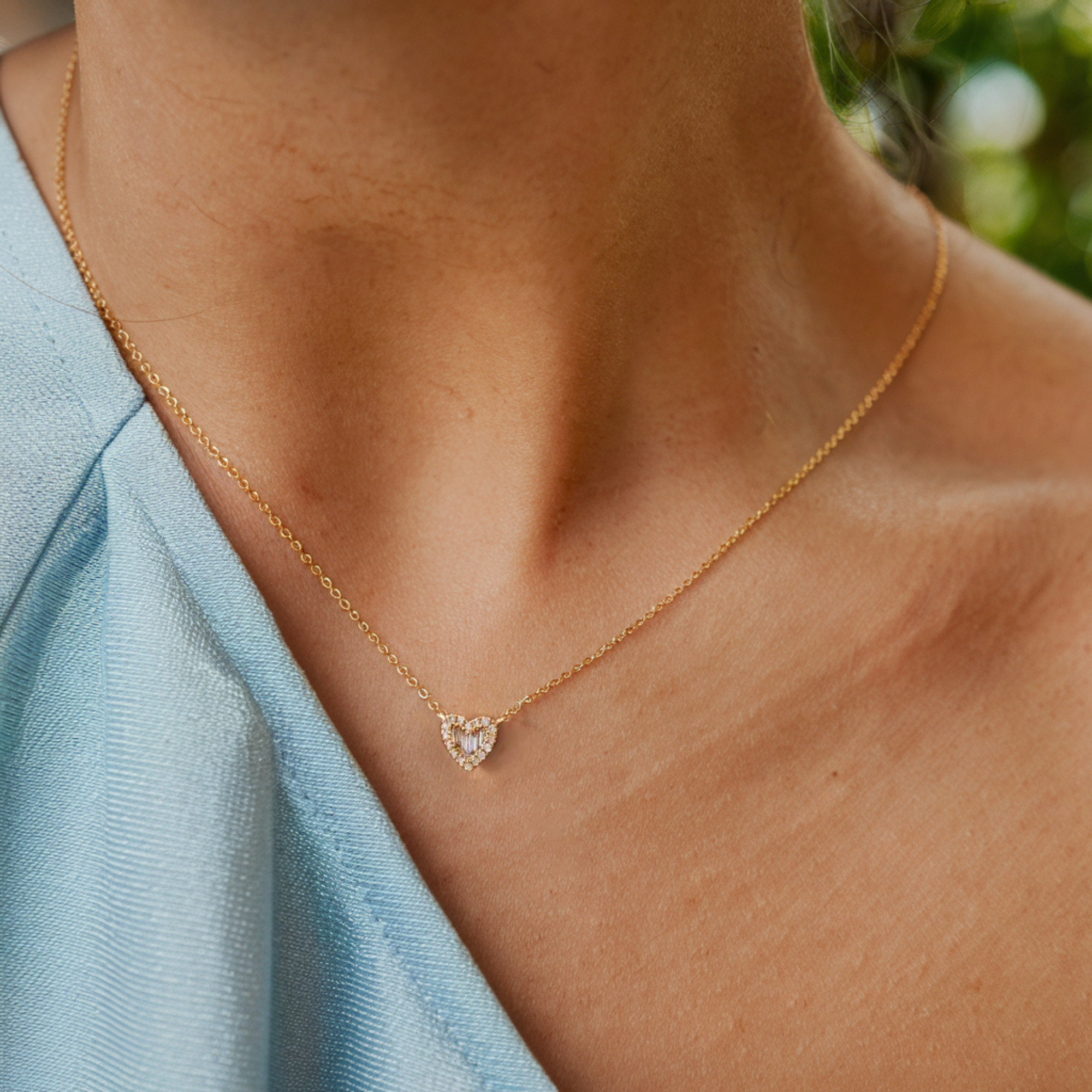 Collier cœur avec diamants taille baguette