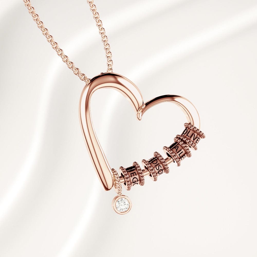 Hartketting met gegraveerde kralen & diamant