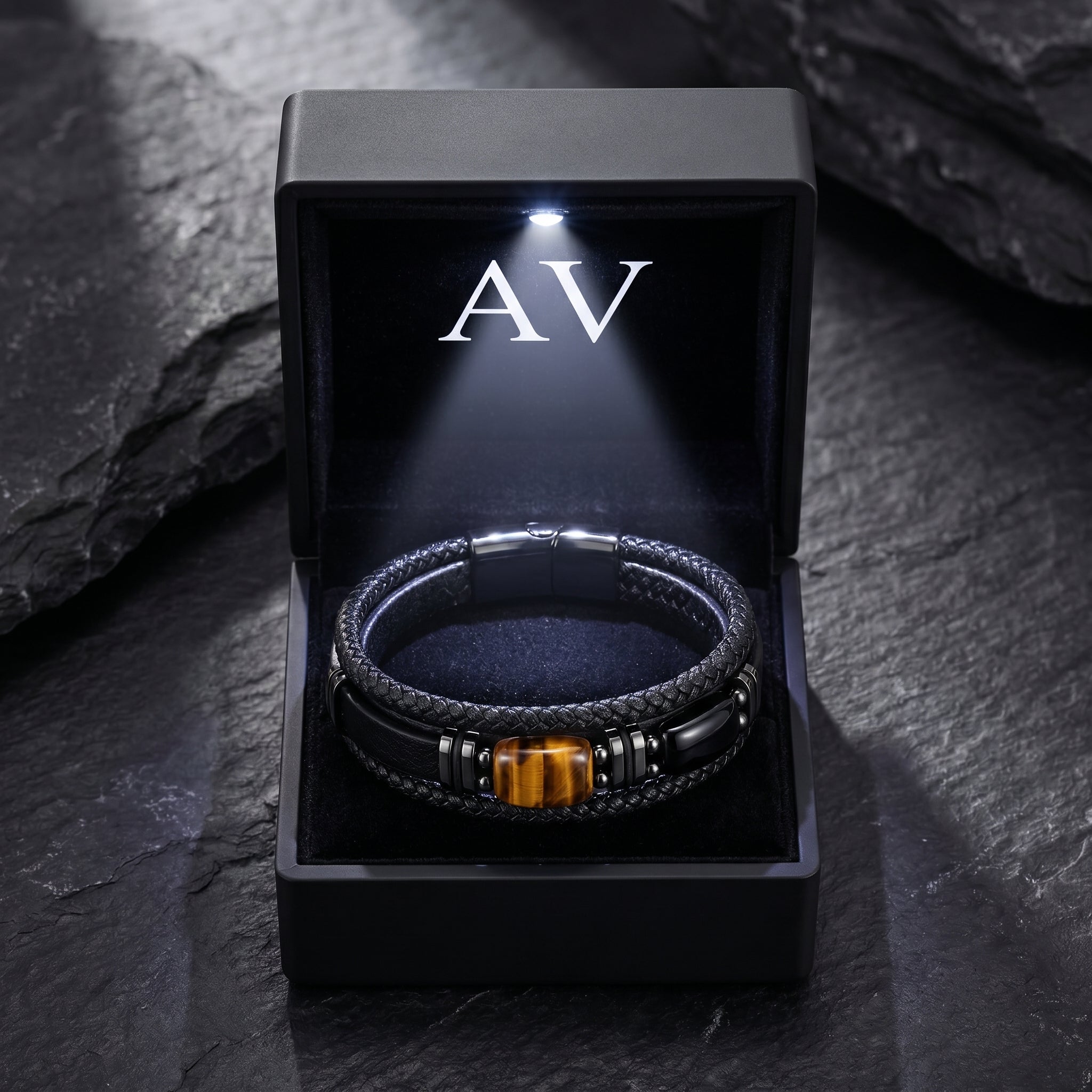 The Citadel black leather bracelet with tiger's eye stone in a premium black gift box with an LED light.