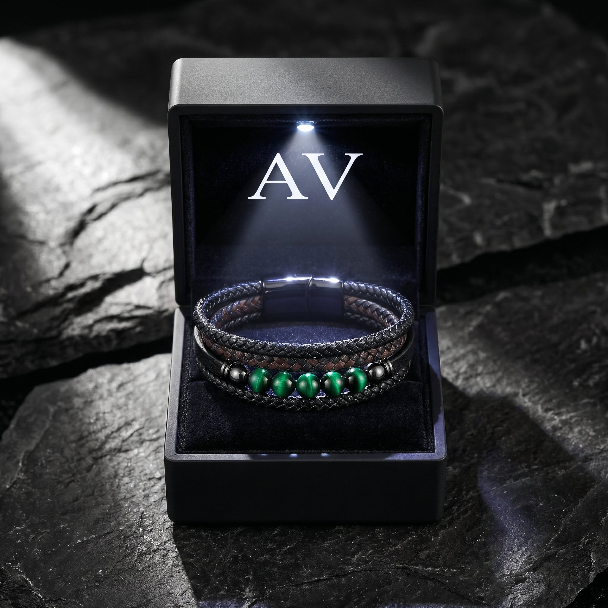 Men's green tiger eye and black leather bracelet inside a premium black LED-lighted gift box.