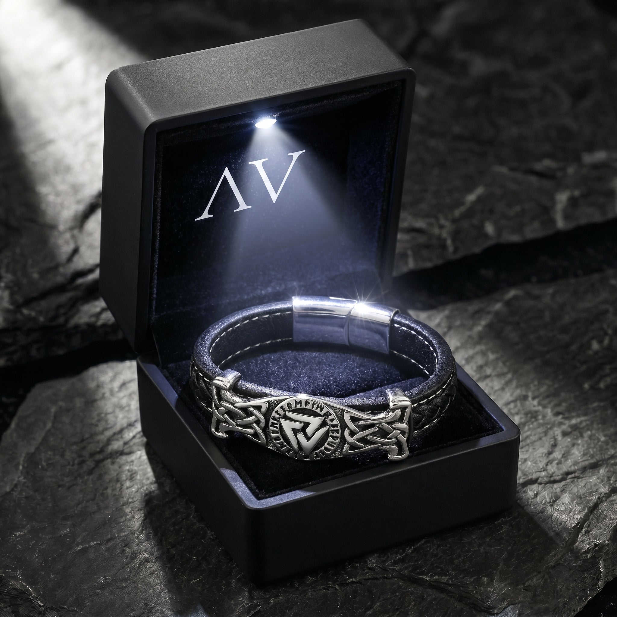 Black leather Runeknot bracelet presented in a premium black gift box with an integrated LED light.