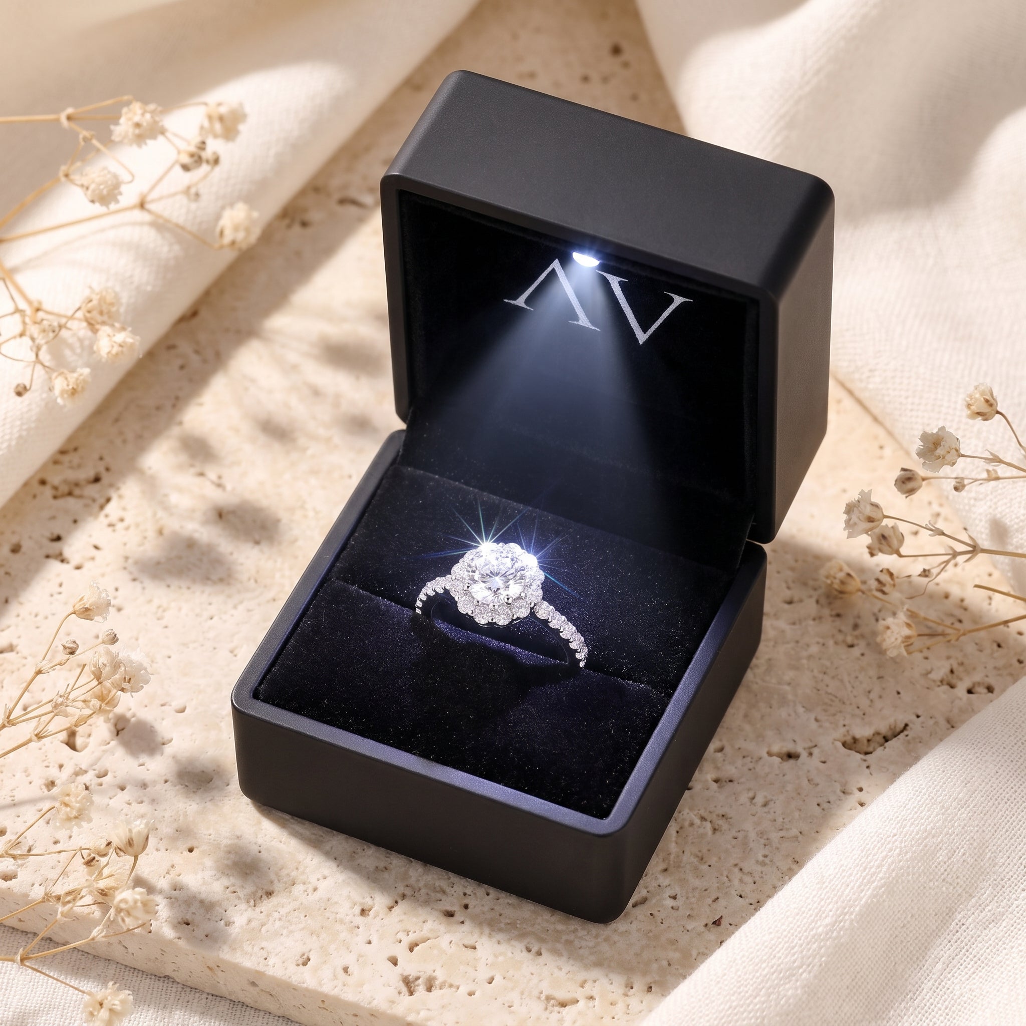 S925 silver floral halo promise ring sparkling inside a black LED-lighted gift box.