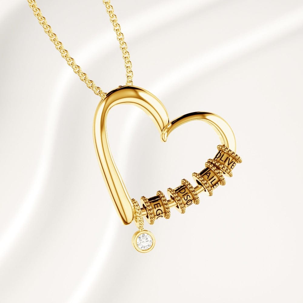 Herzkette mit gravierten Perlen und Diamant