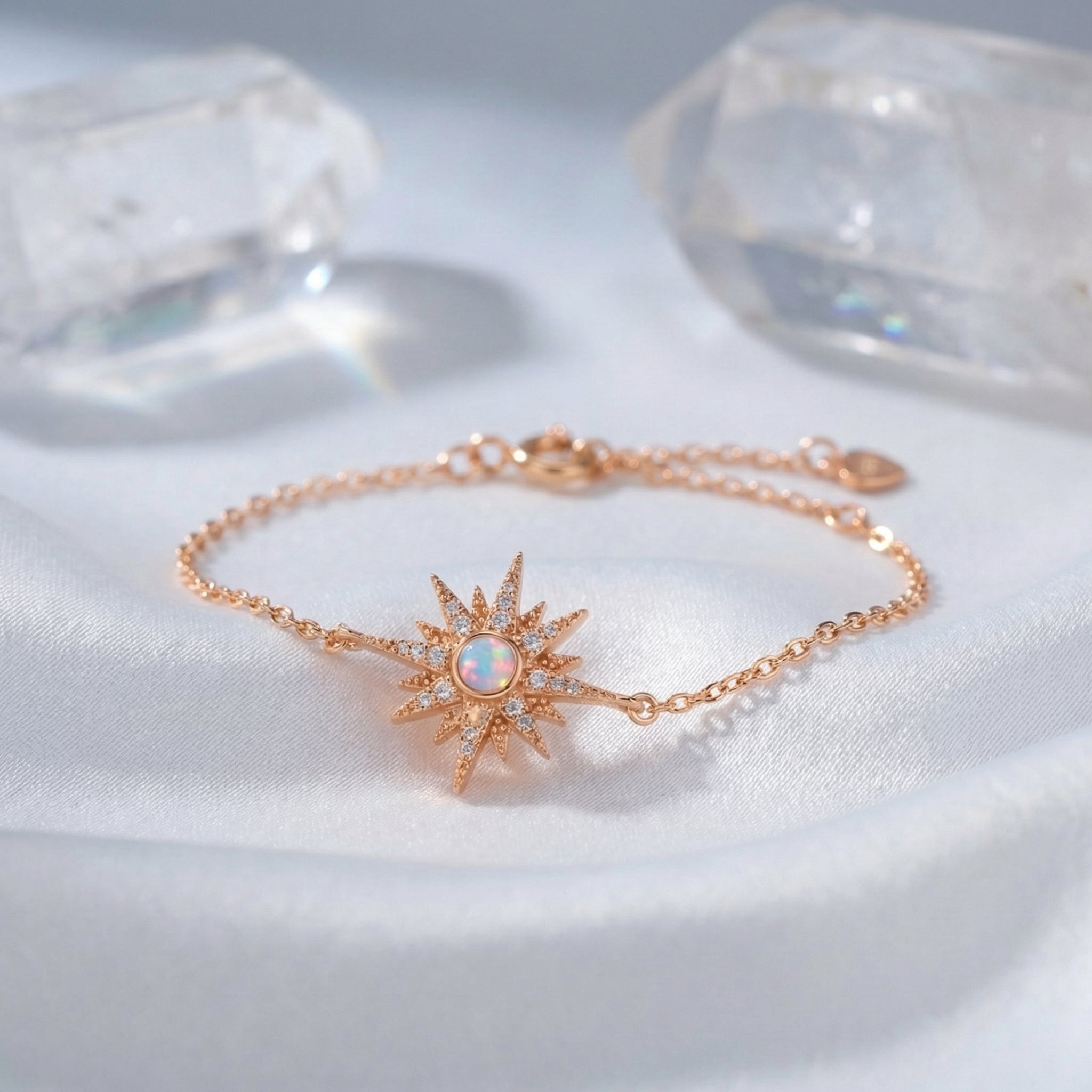 A solid rose gold tennis bracelet with natural white opals.