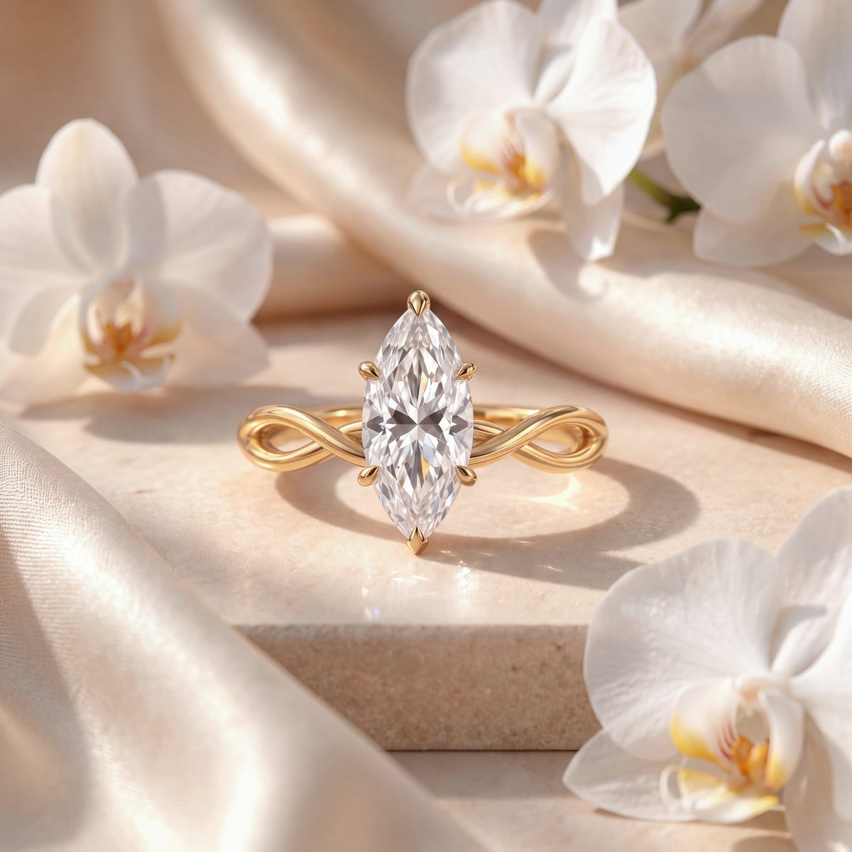 Gold engagement ring featuring a marquise-cut moissanite stone on a twisted infinity band.