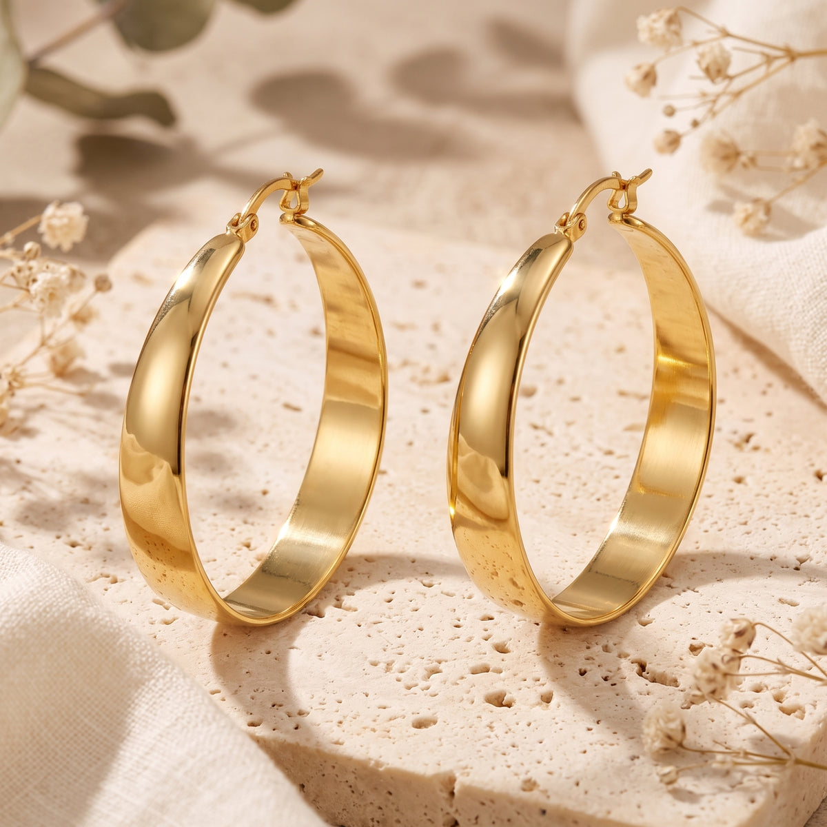 The Sculptural Tapered Hoop Earrings