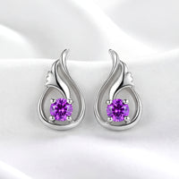 S925 sterling silver Lysithea drop earrings with round-cut simulated amethyst in a tulip bud setting on white fabric.