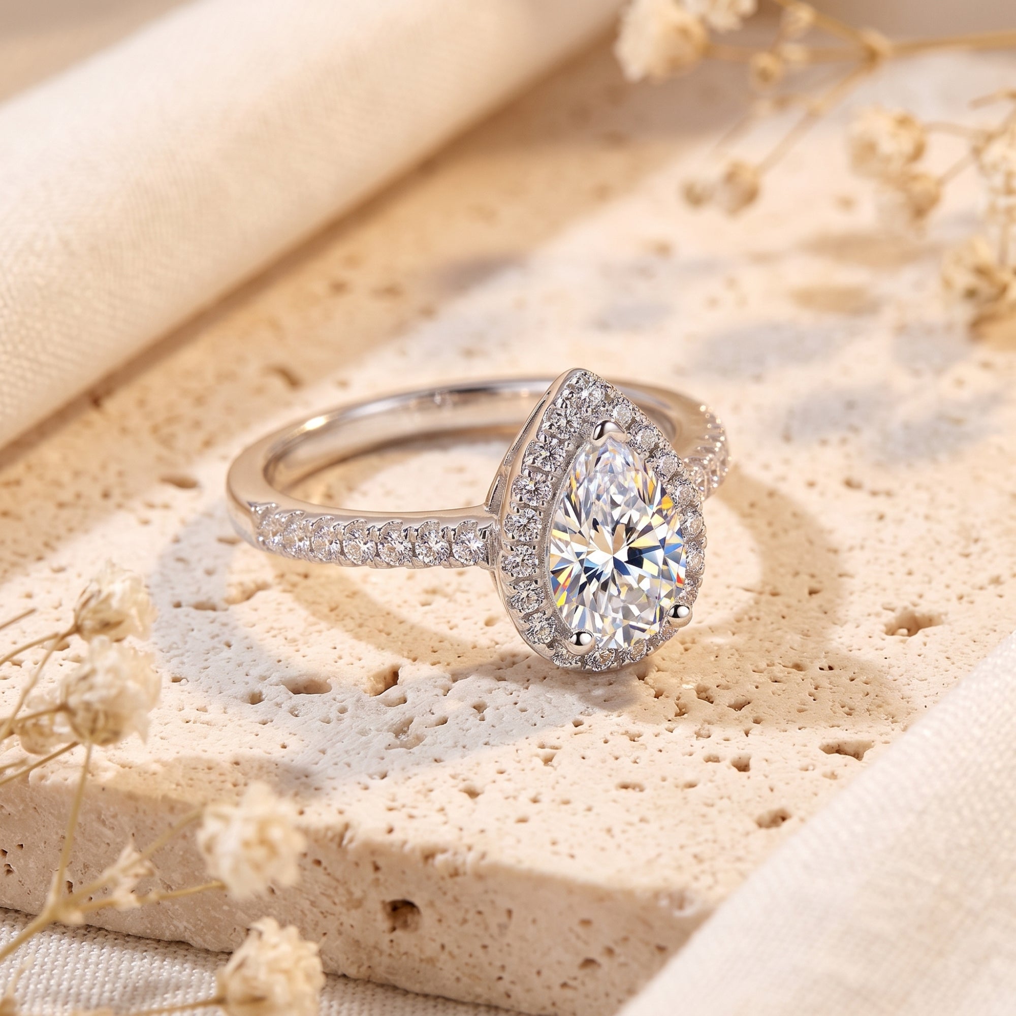 The Aria Teardrop Halo Ring