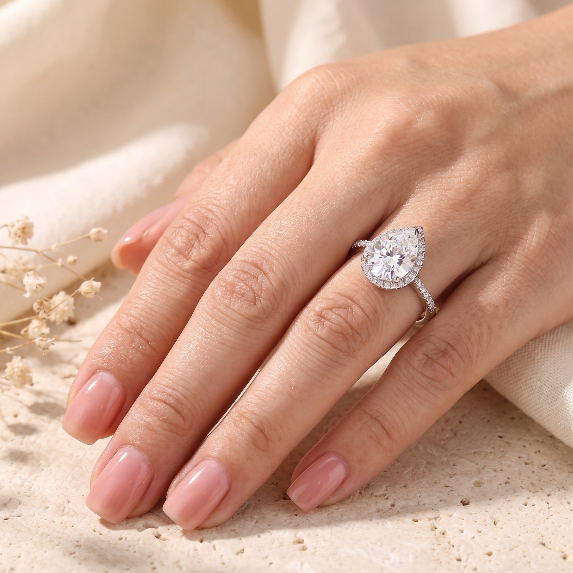 The Teardrop Halo Ring