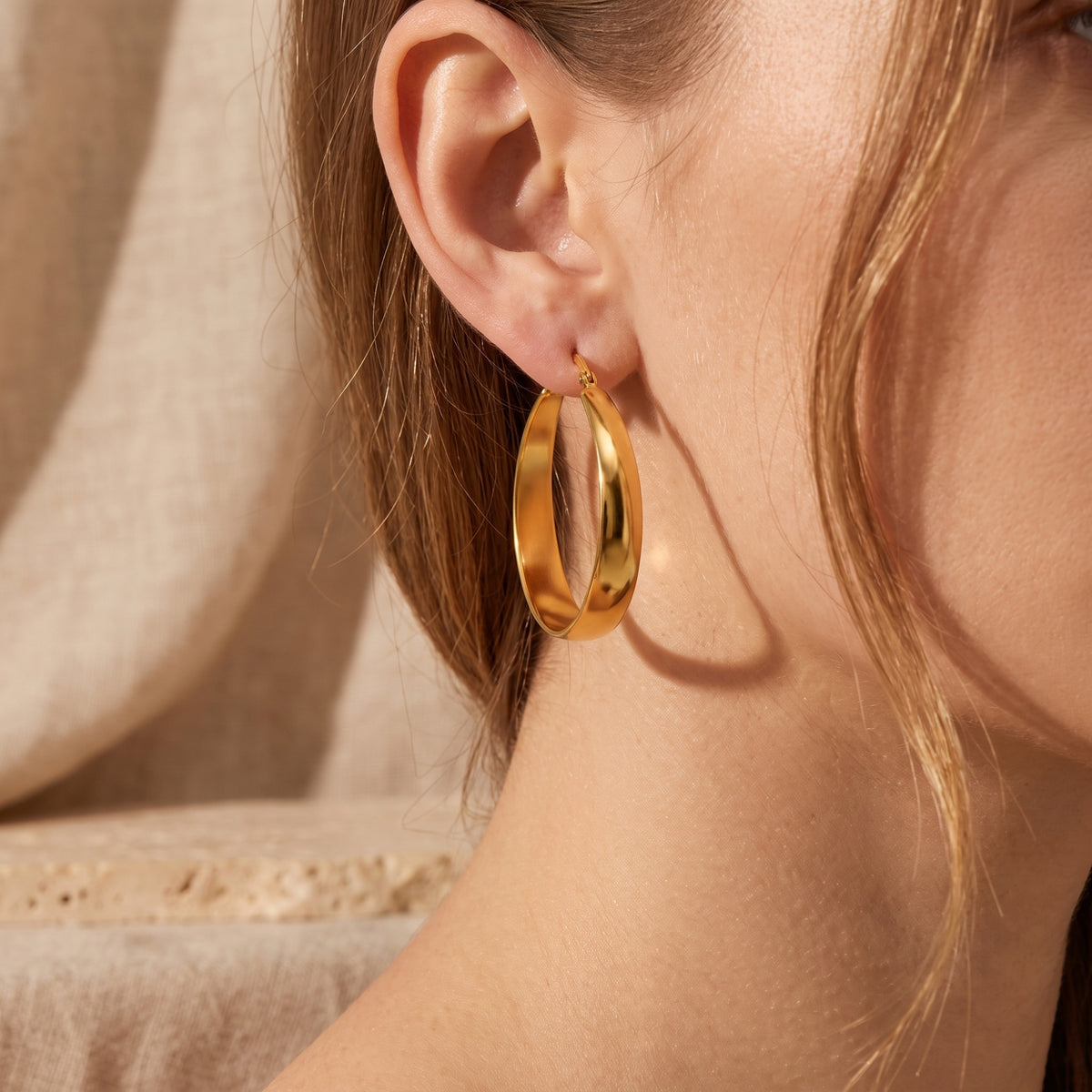 The Sculptural Tapered Hoop Earrings