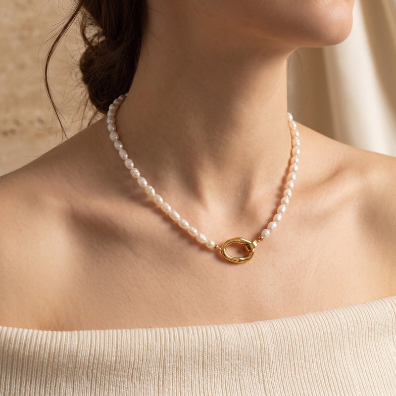 Model wearing Audrielle 18K gold PVD necklace with white rice pearls.