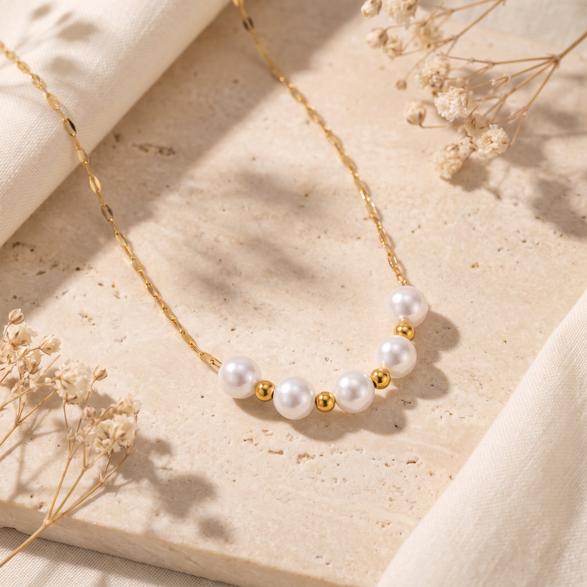 The Aura Pearl Station Necklace