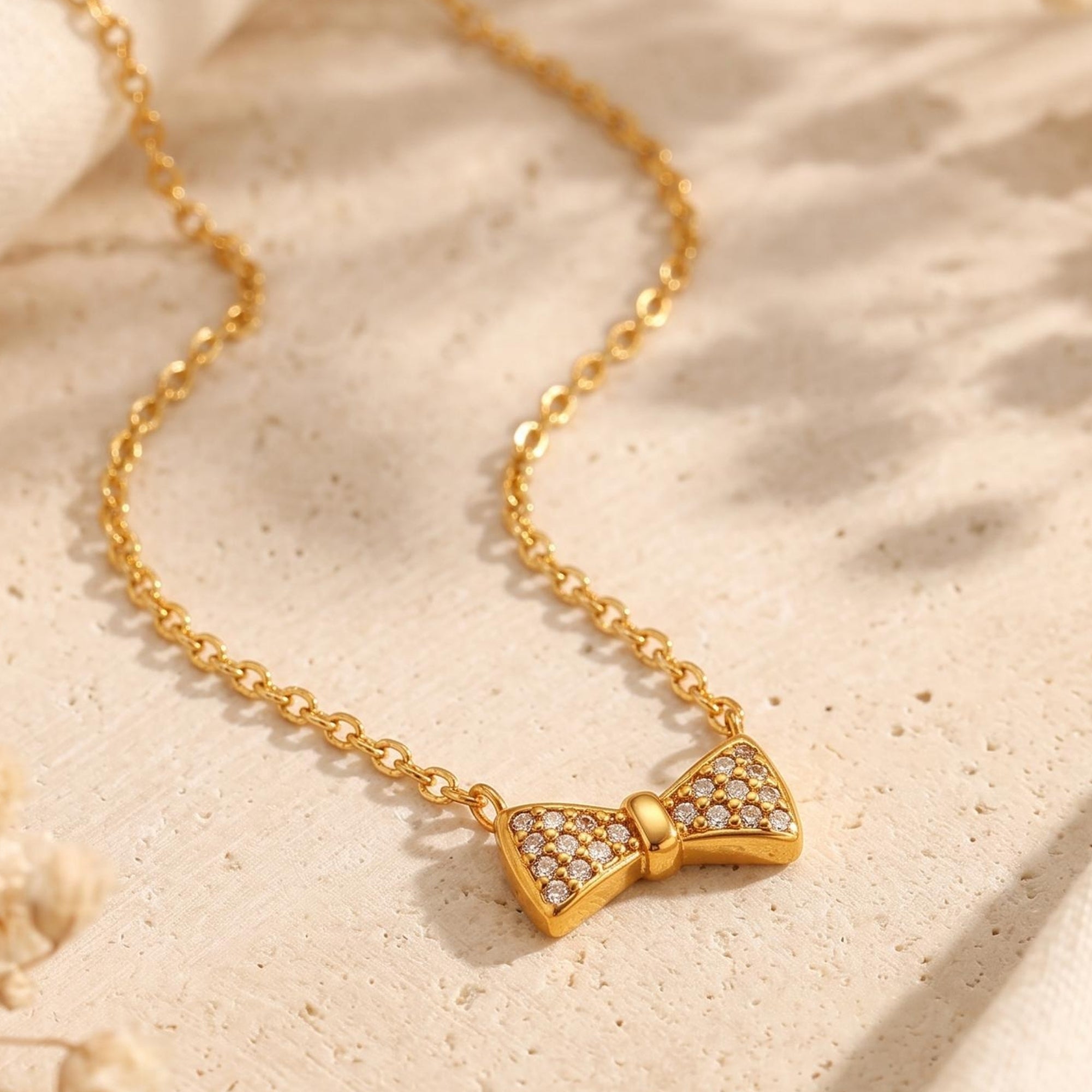 The Pave Bow Pendant Necklace