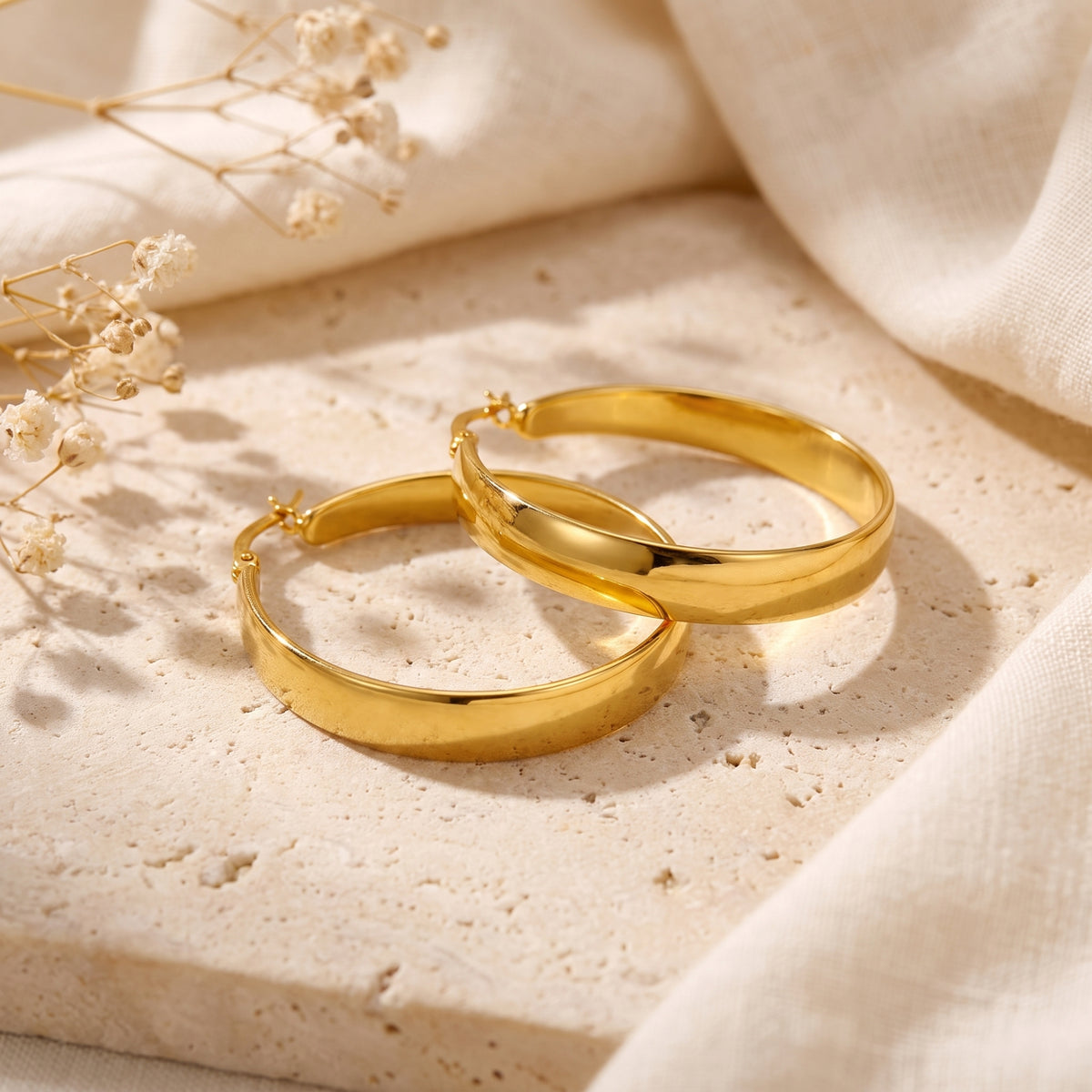 The Sculptural Tapered Hoop Earrings