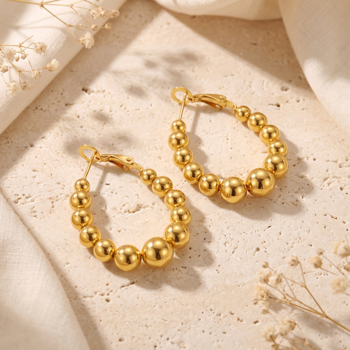 The Graduated Beaded Hoop Earrings