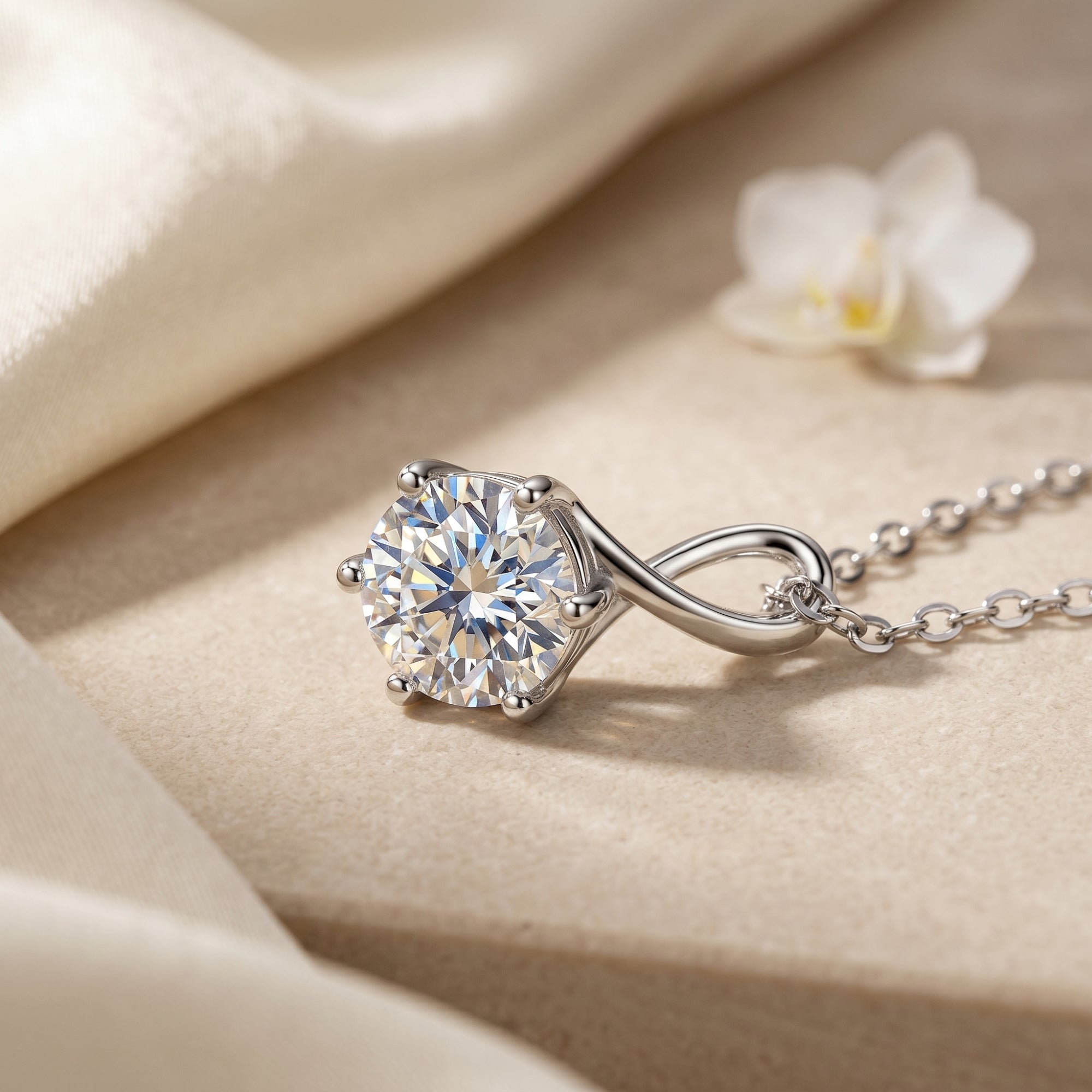Macro view of silver twist pendant with round moissanite stone.