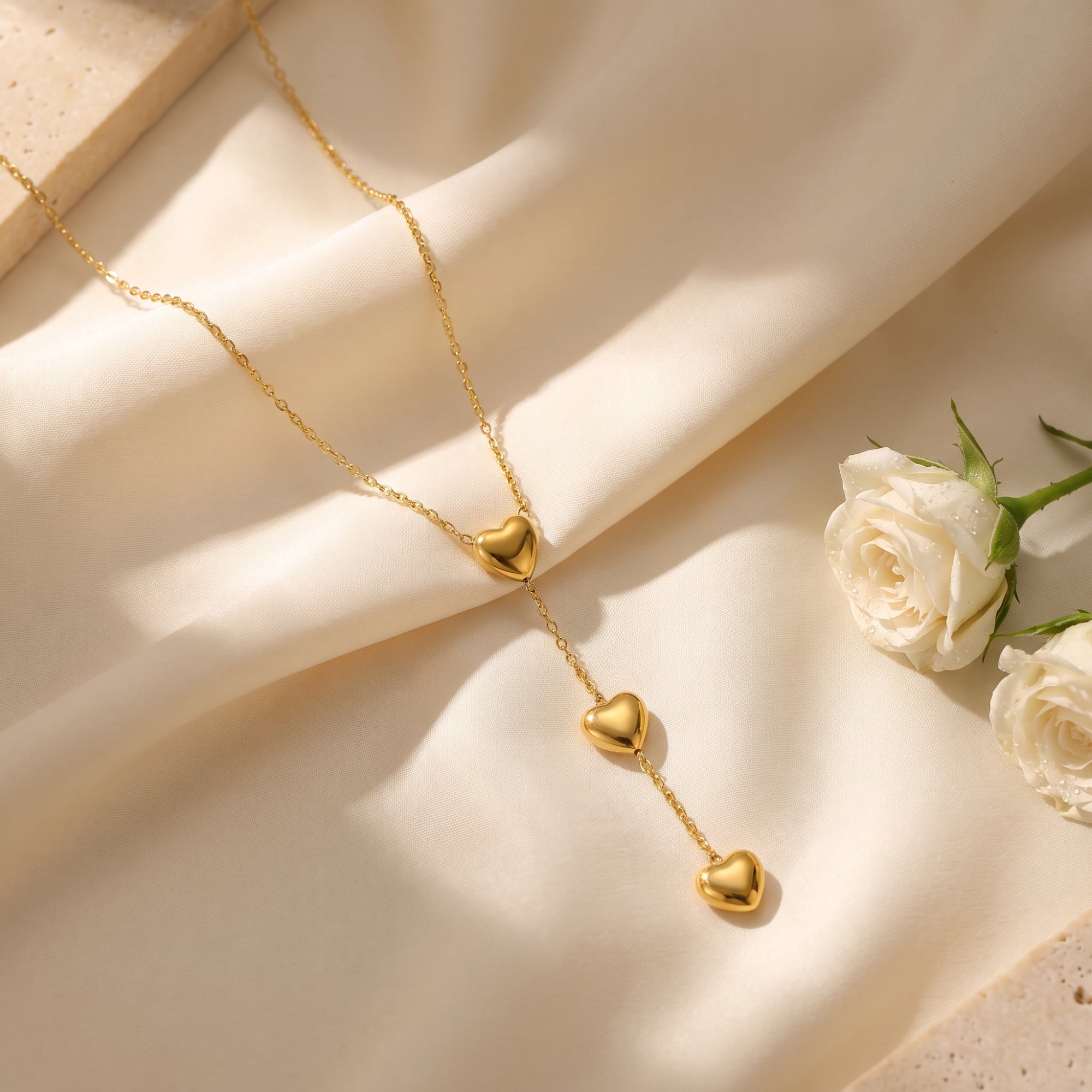 The Triple Heart Lariat Necklace