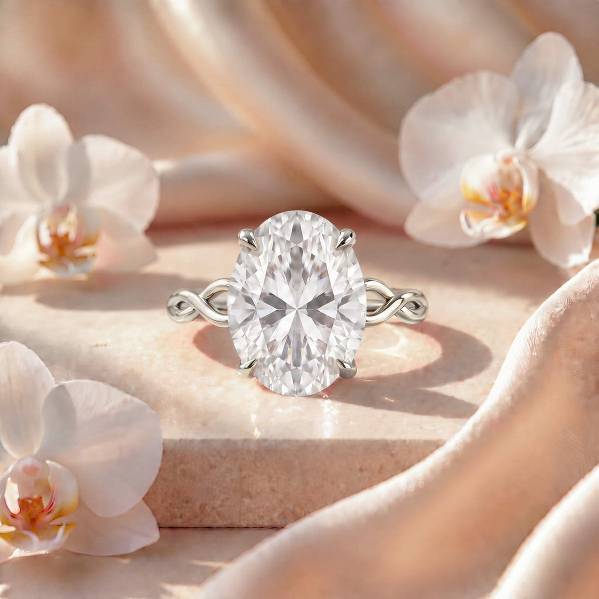 Front view of an oval moissanite engagement ring with a twisted white gold band.