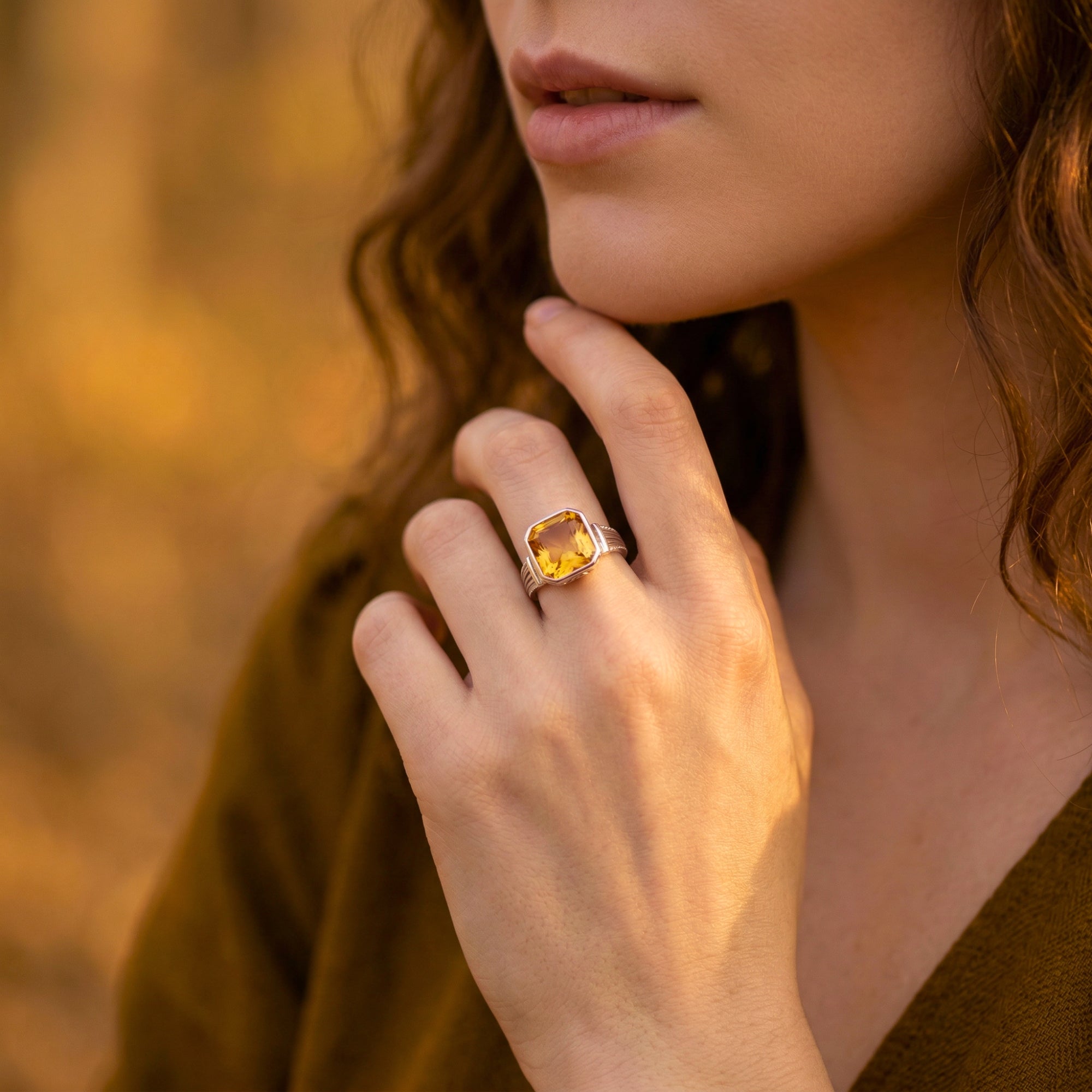 Model wearing the Asscher cut natural citrine statement ring in sterling silver.