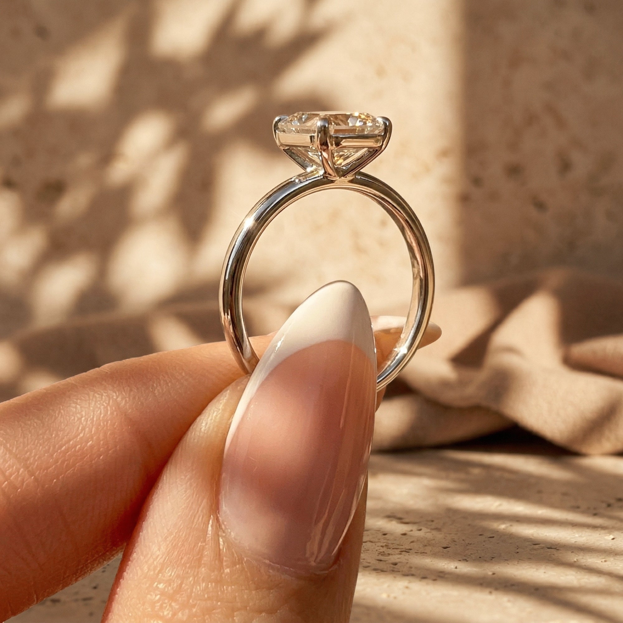 The Astrid Emerald Cut Bezel Ring