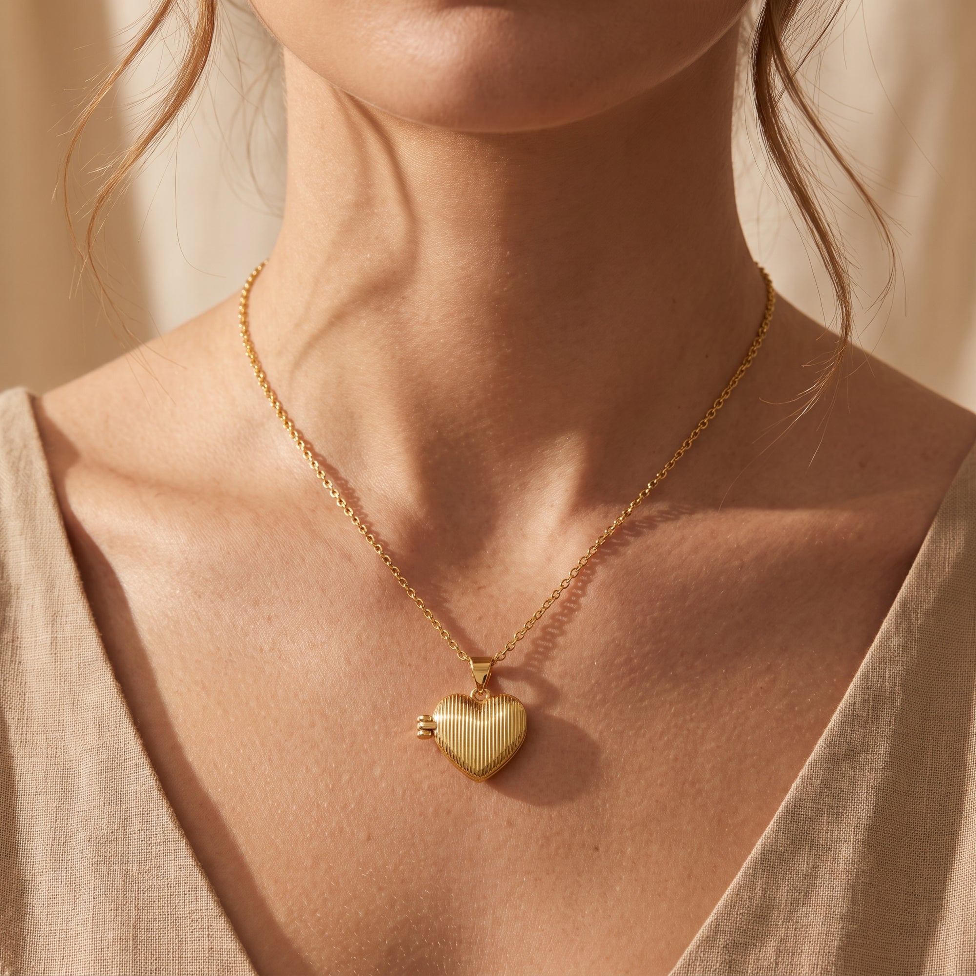 The Ribbed Heart Locket Necklace