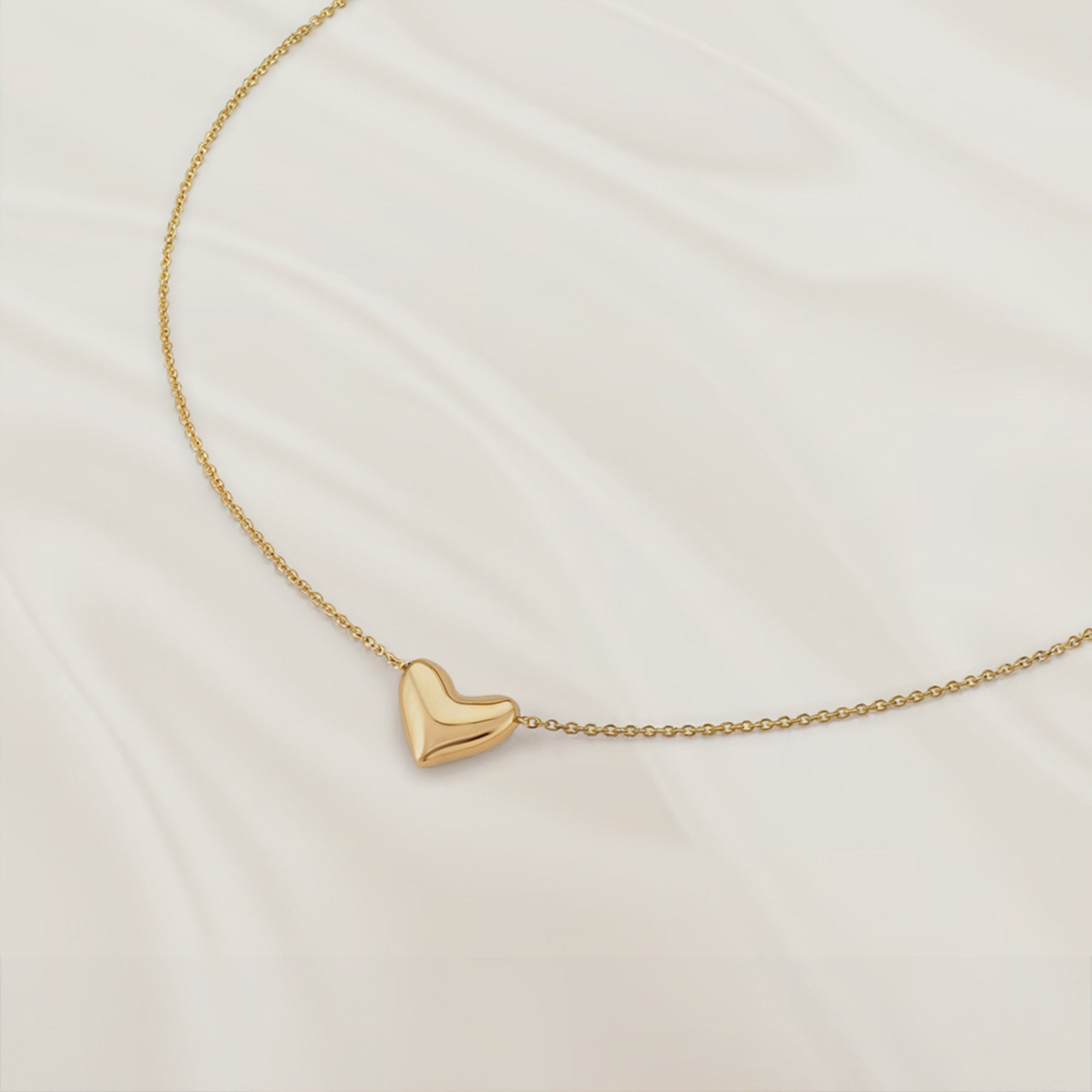 Adjustable solid gold heart necklace with 11mm by 12mm pendant