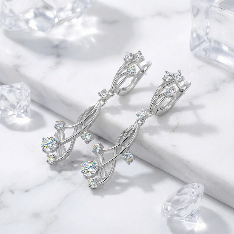 Detail of S925 sterling silver vine drop earrings with round zirconia stones showing the hinged lever back clasp.