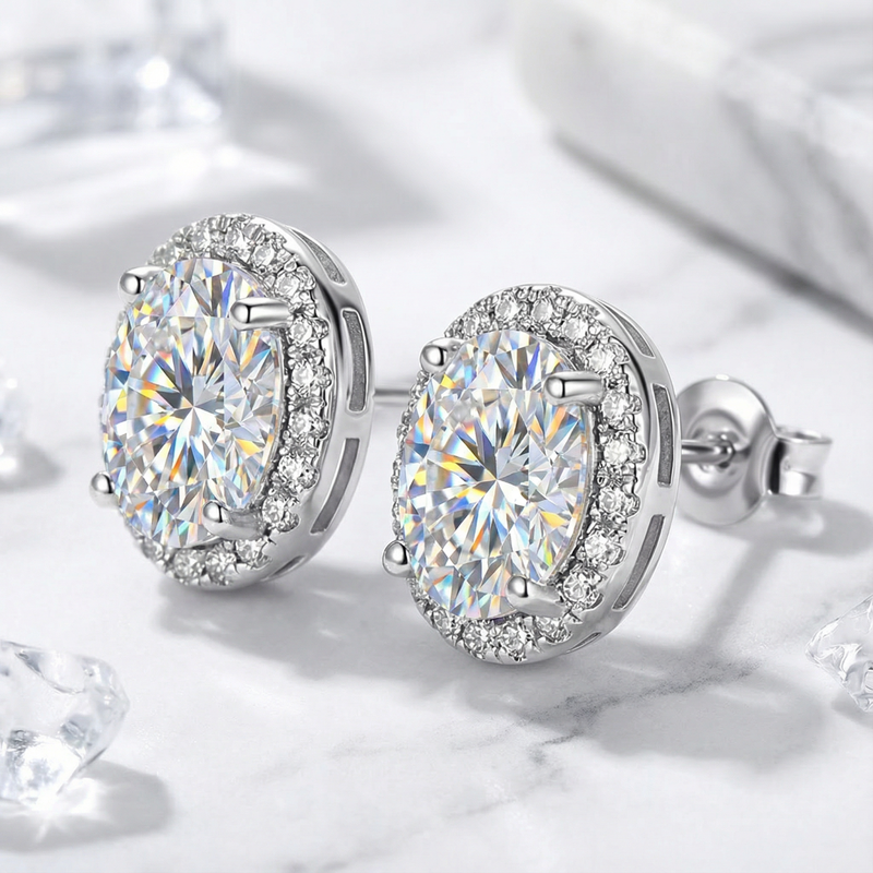 Close-up of sterling silver halo stud earrings with round cut zirconia, showing the side setting and back.