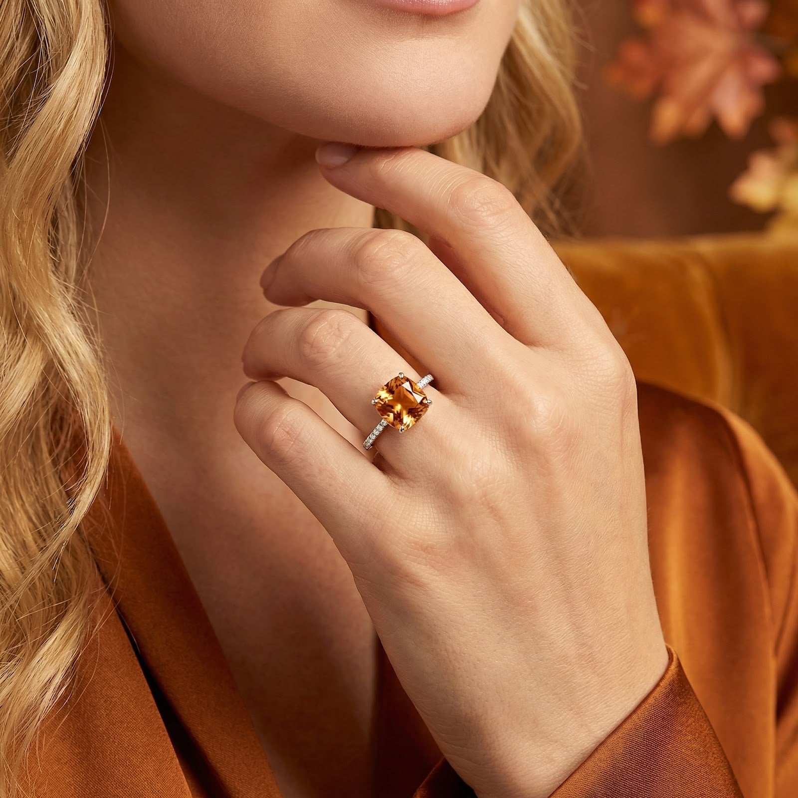 Model wearing the Eliora cushion cut simulated topaz ring in S925 sterling silver on her hand.