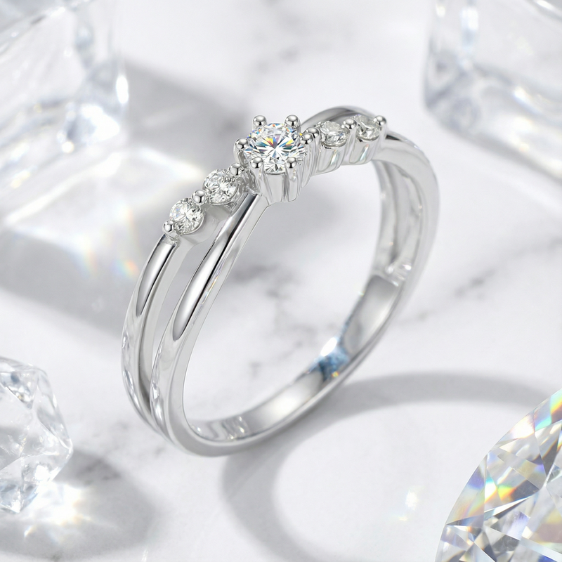 Angled close-up of the Iseltra S925 sterling silver bypass ring showing the round-cut simulated diamond.