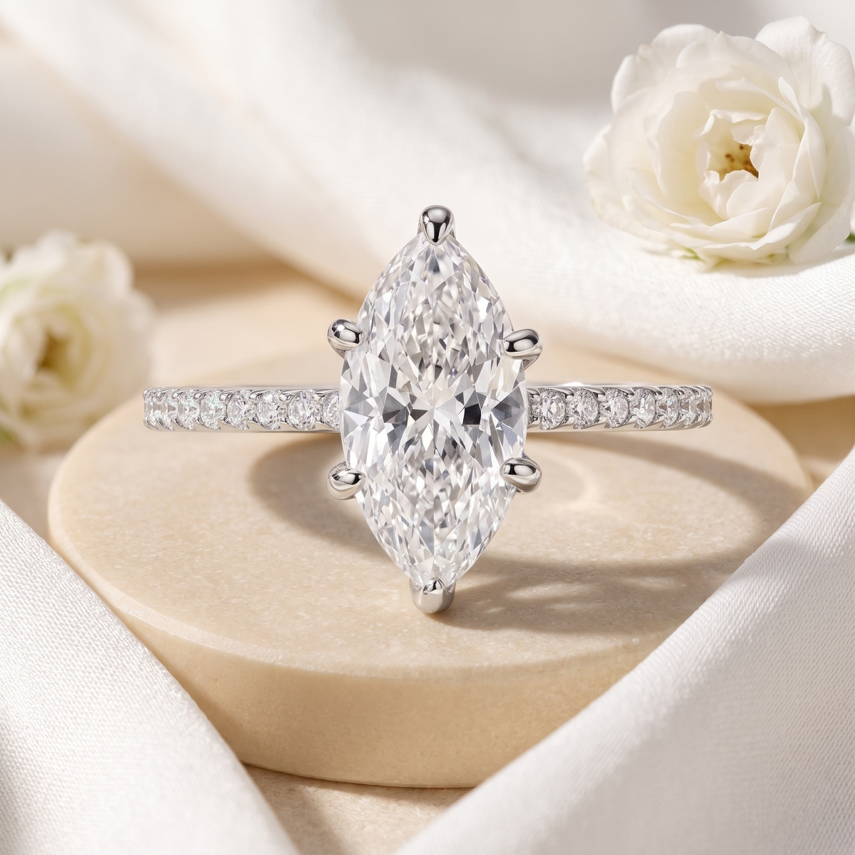 Six-prong marquise moissanite ring in silver, front product view.