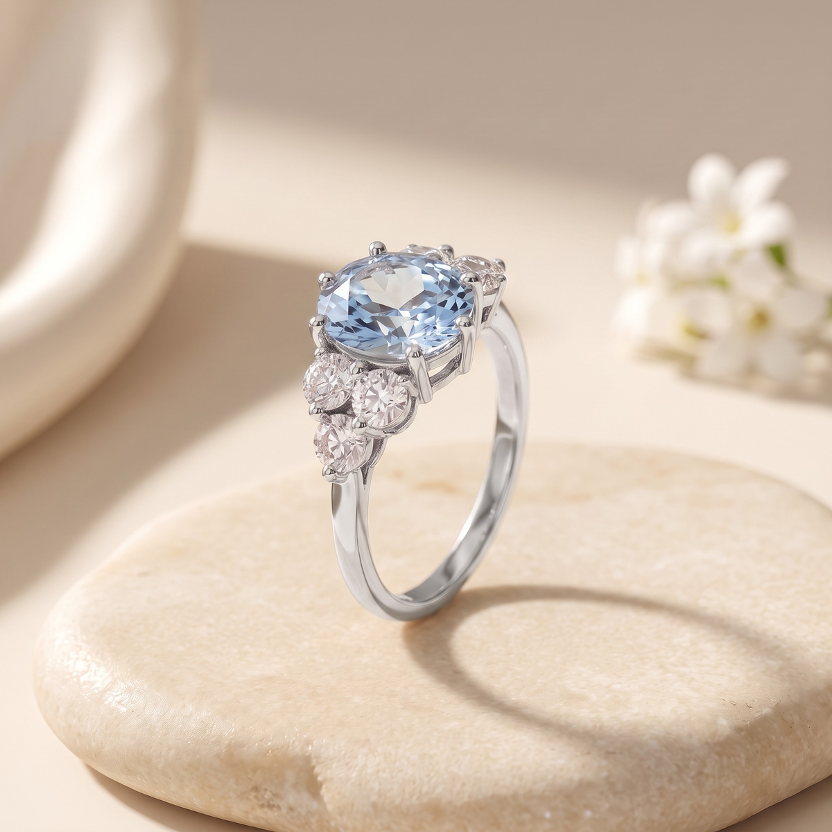 The Fiorella blue oval cluster moissanite ring in silver, isolated product view