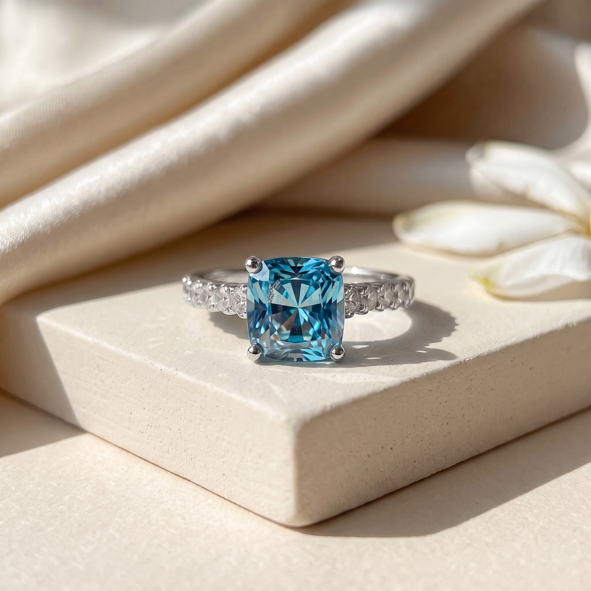 The Juliana Hope blue cushion moissanite ring in silver, isolated product view