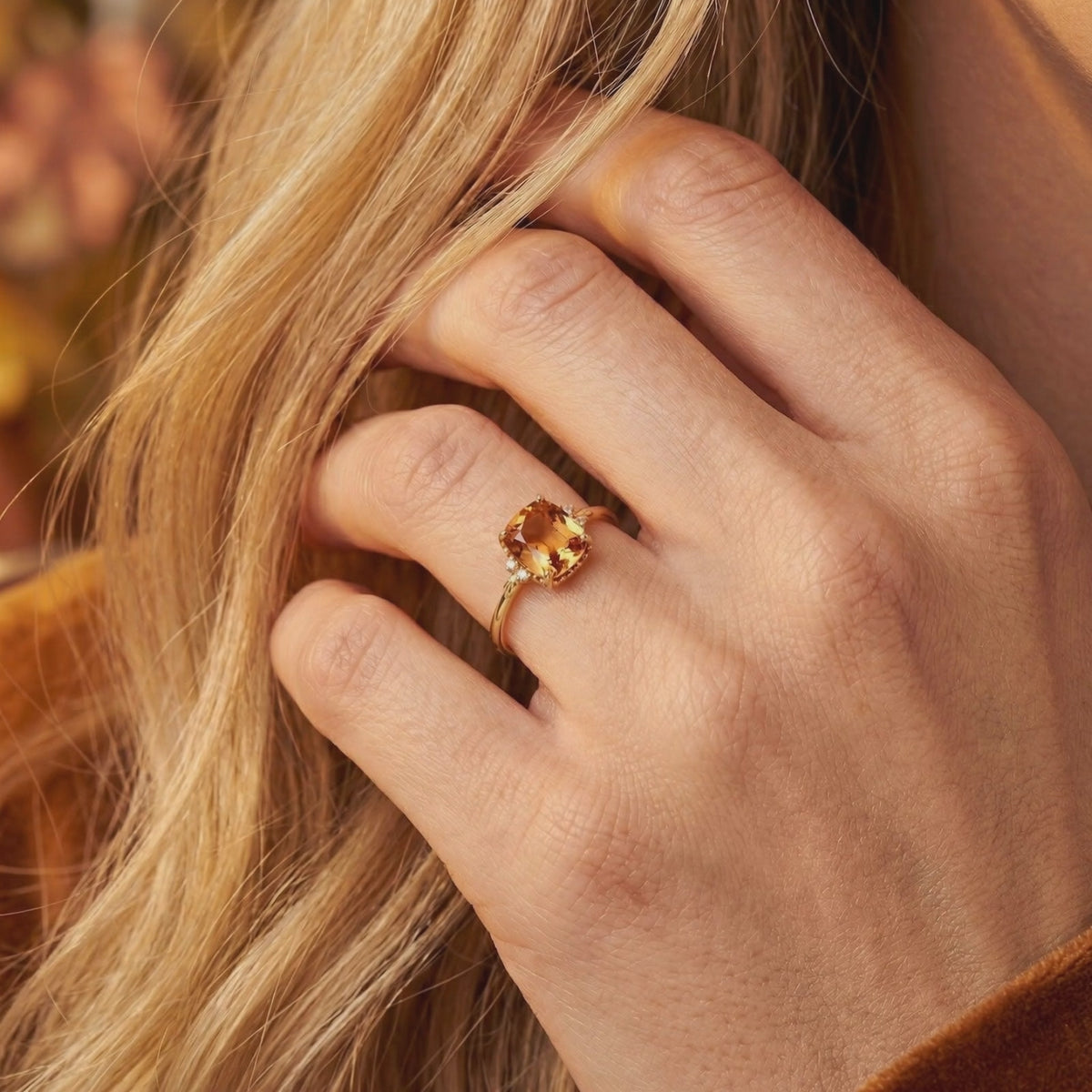 Video showcasing the solid gold cushion-cut simulated topaz ring.