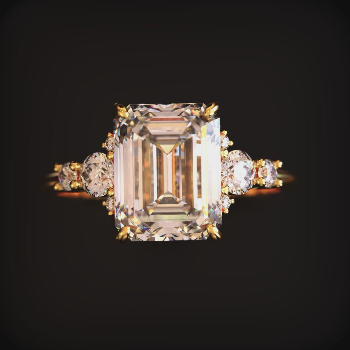 A ring with a 3 carat emerald-cut moissanite in solid gold.