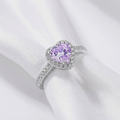 Heart-cut simulated amethyst halo ring in solid gold.