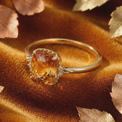 Video showcasing the solid gold cushion-cut simulated topaz ring.