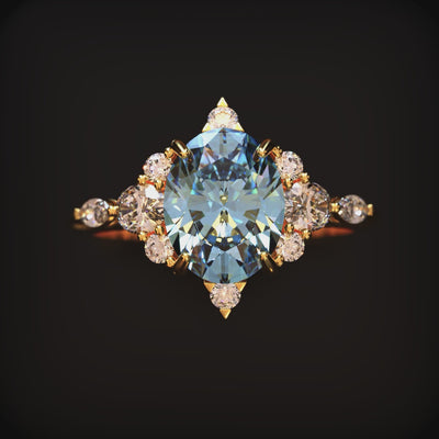 Video showing a close frontal view of The Carlotta 2 carat oval blue moissanite ring in solid gold.