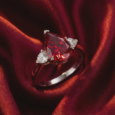 The Rosalyne Pear simulated ruby ring in solid gold.